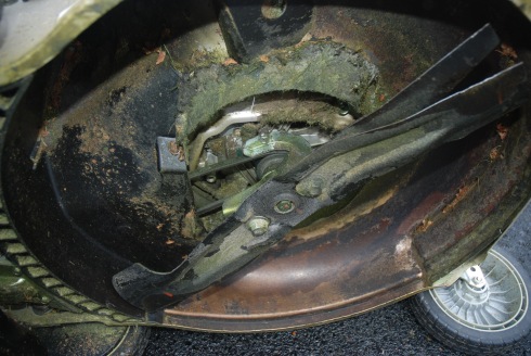 Cause for concern: the drive belt that connects blade pulley to motor is completely exposed to flying debris inside the mower deck.